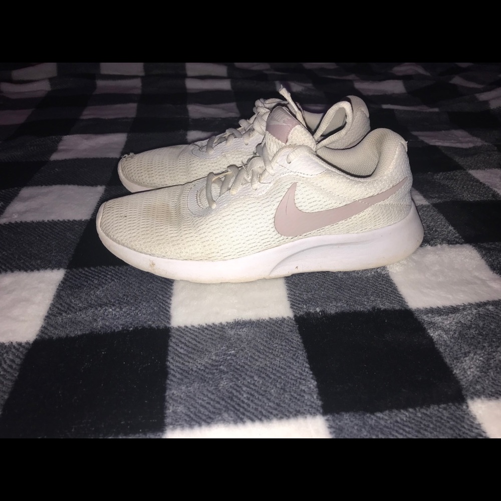 Very broke in Nike tennis shoes 7.5 W